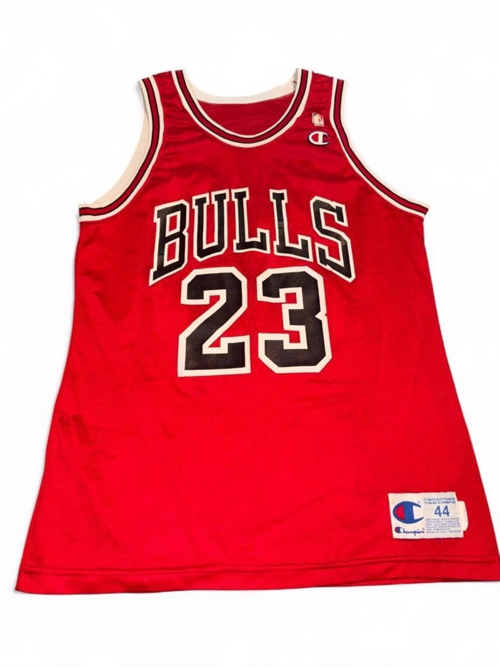 Iconic vintage Michael Jordan Chicago Bulls jersey by Champion! Classic red mesh